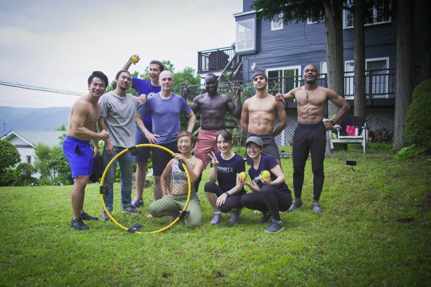 Crew with a Spikeball set at the anniversary retreat
