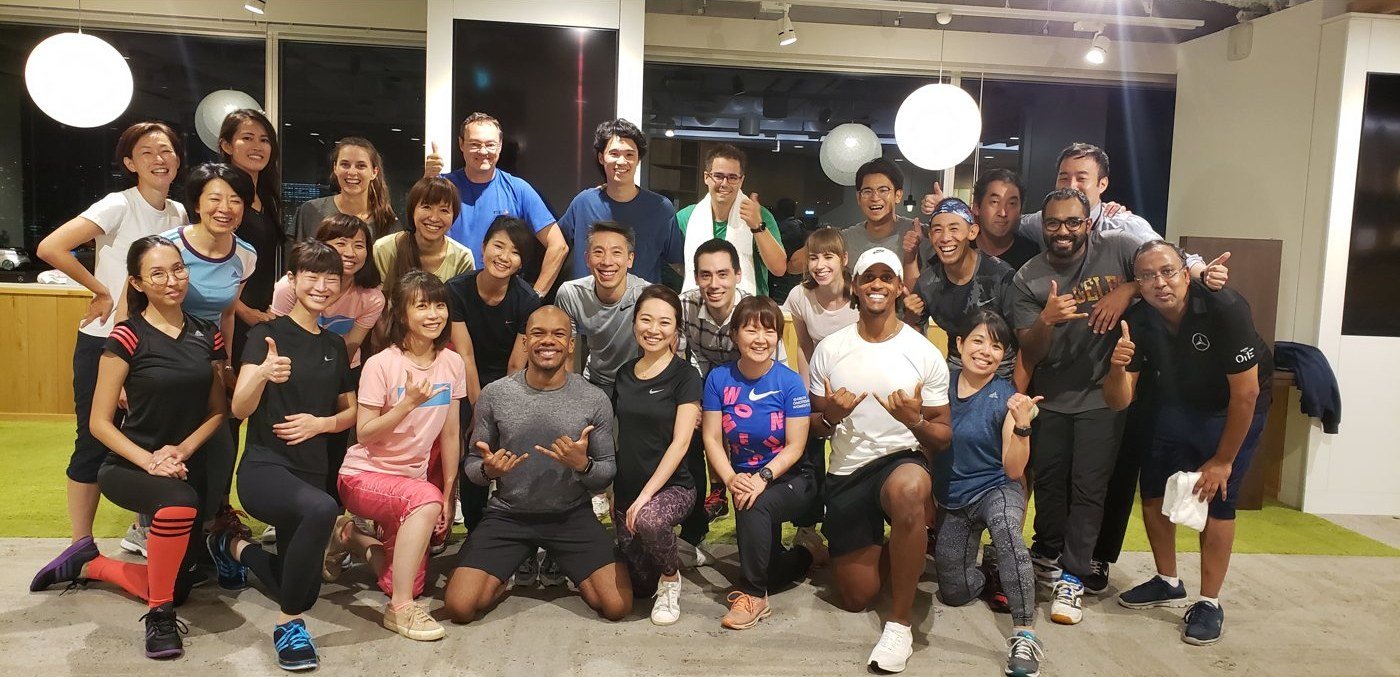 Large corporate team after a group workout session